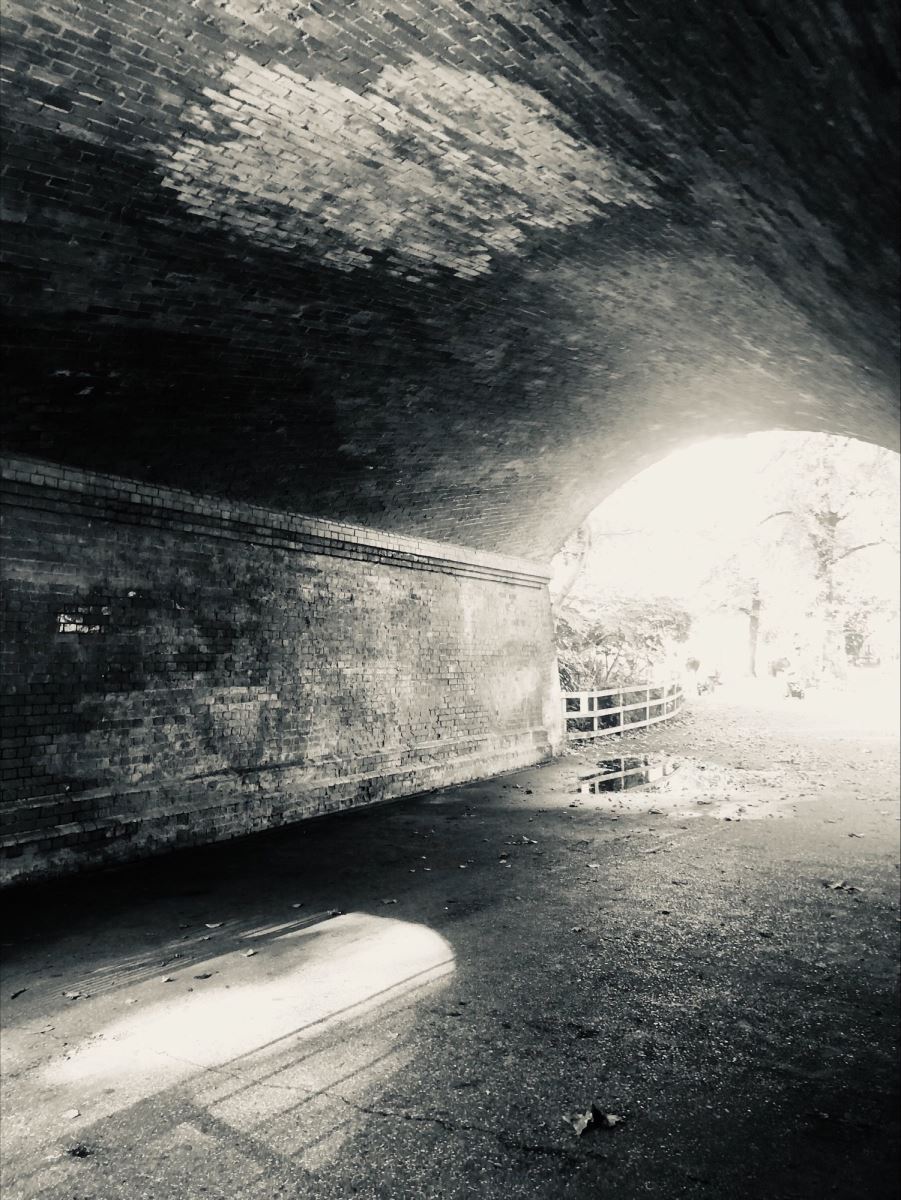 black and white photo of a tunnel
